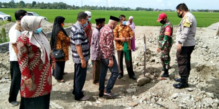 Babinsa Koramil 1404-04/Sawitto dan Bhabinkantibmas Polsek Sawitto Adalah Bukti Sinergitas TNI-Polri Dilapangan