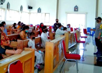 Kekompakan Babinsa dan Bhabinkamtibmas Dalam Pengamanan Perayaan Paskah