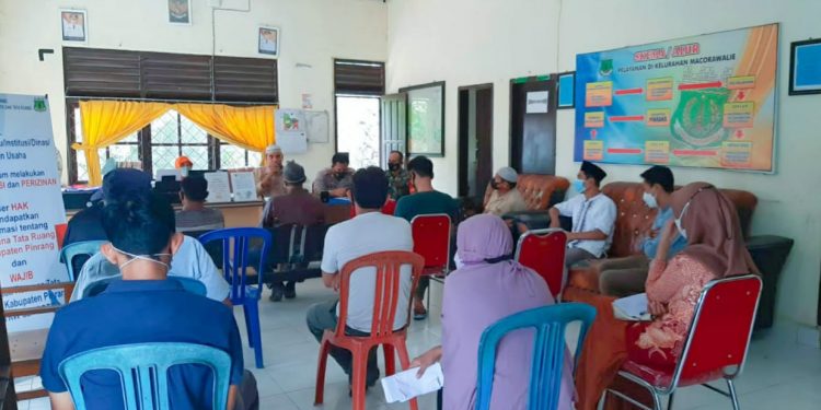 Rapat Koordinasi Pelaksanaan PPKM Level 3 Kelurahan Macorawalie di Hadiri Tiga Pilar Kelurahan